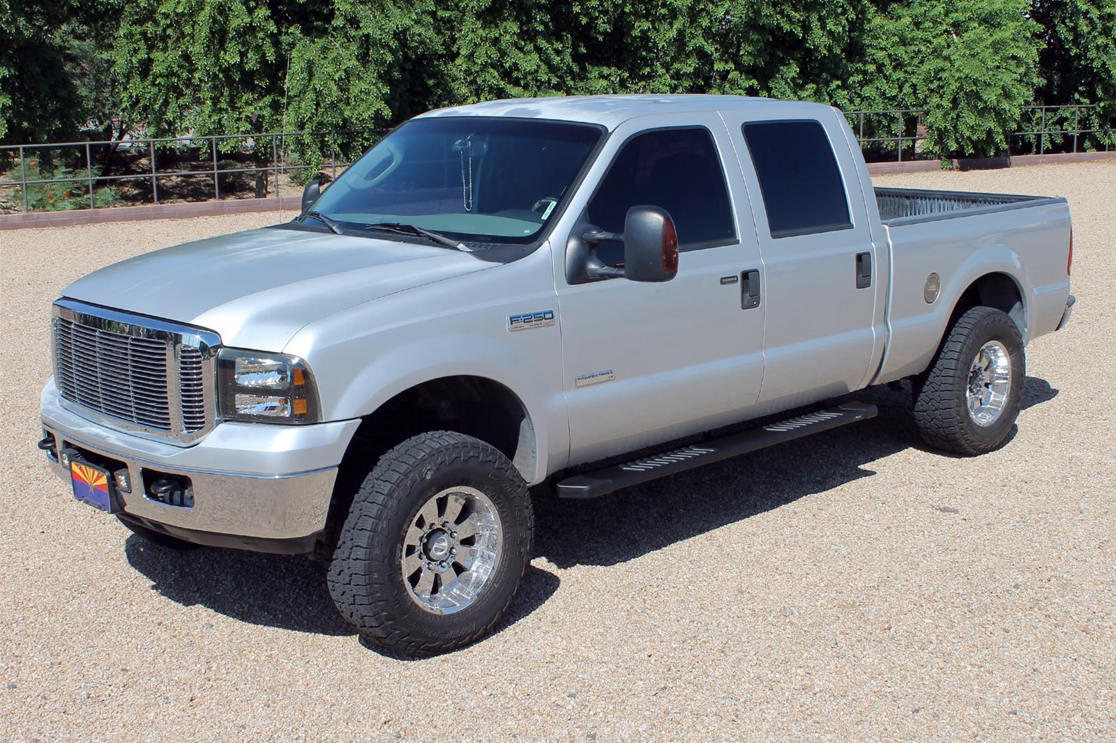 Raptor Series 6 in. OEM-Style Slide Track Oval Running Boards for 1999-2016 F-250 SUPER DUTY, F-350 DUTY - 1703-0343BT Boards, Tread Step, OEM-Style, Aluminum, Black, Textured, Extended Cab, Ford, Pair